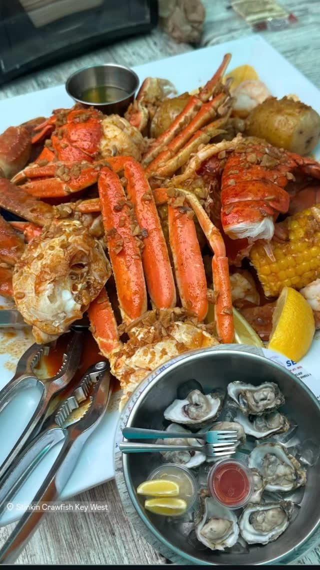 Snow crab legs and raw oysters