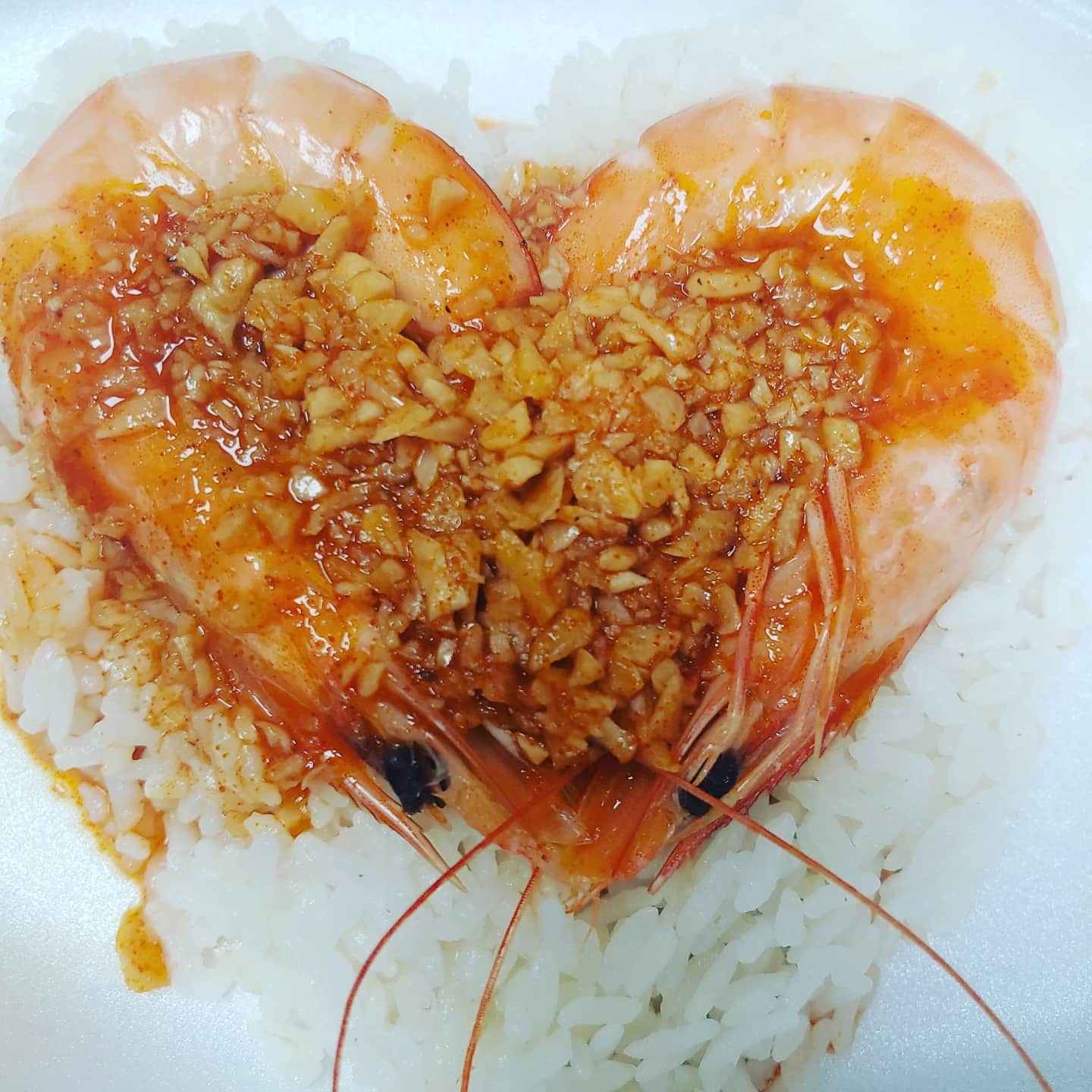 Shrimp in garlic sauce over rice